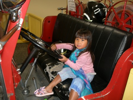 (Discovery Center) Kasen in the fire truck
